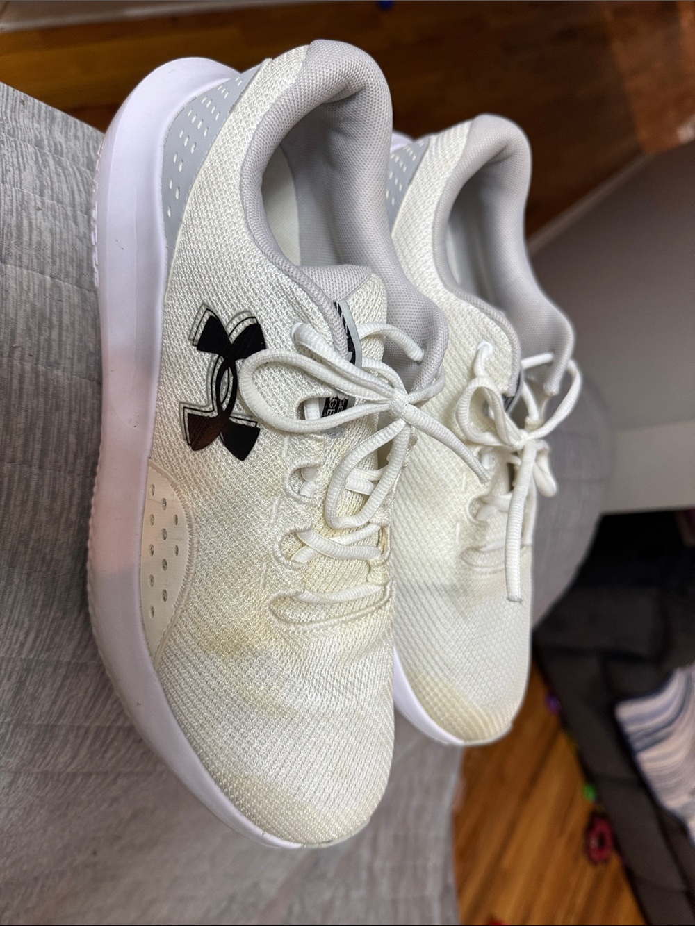 Under Armour Women's White Athletic Trainers with Black Logo